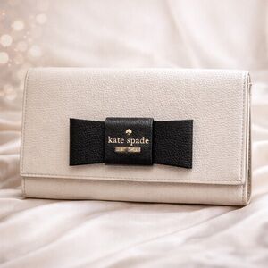 kate spade Cream Clutch With Black Bow